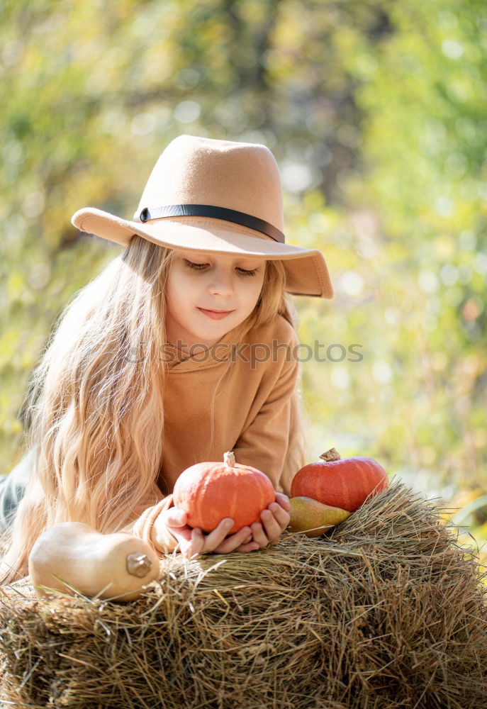 Similar – Image, Stock Photo Young cowgirl in a field of cereals