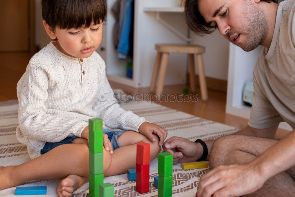 Similar – Image, Stock Photo Little child and father are drawing on a paper.