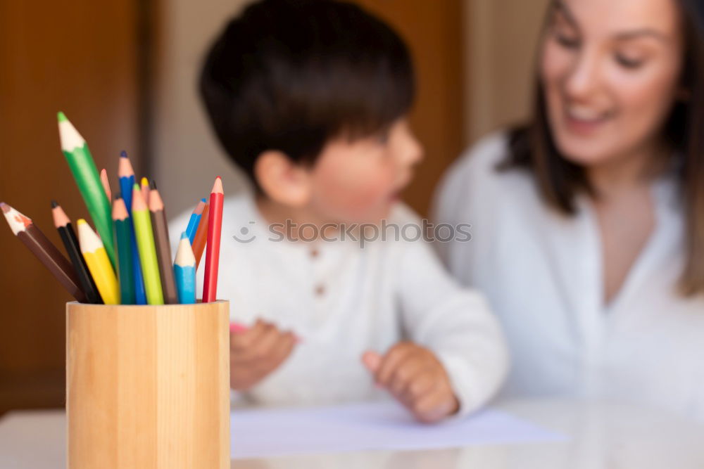 Similar – Image, Stock Photo Mom with little daughter drawing the colorful pictures