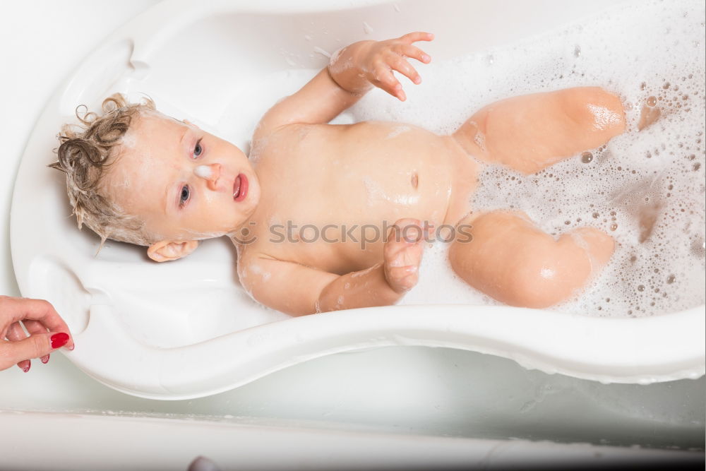 Similar – Image, Stock Photo Newborn taking bath