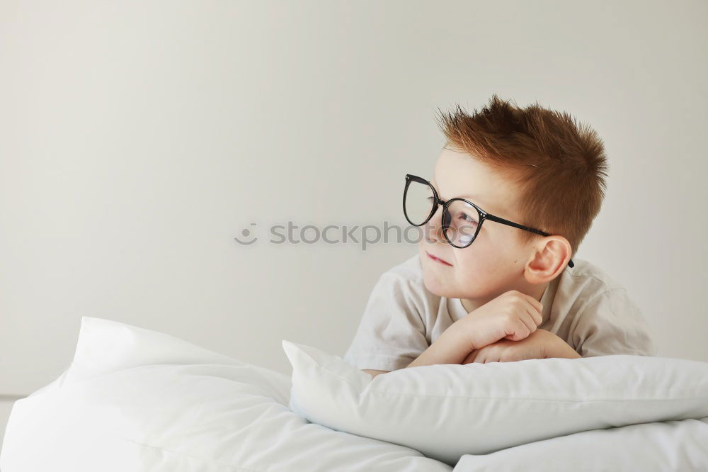 Similar – Image, Stock Photo Portrait of a young sad boy. Concept of loneliness.