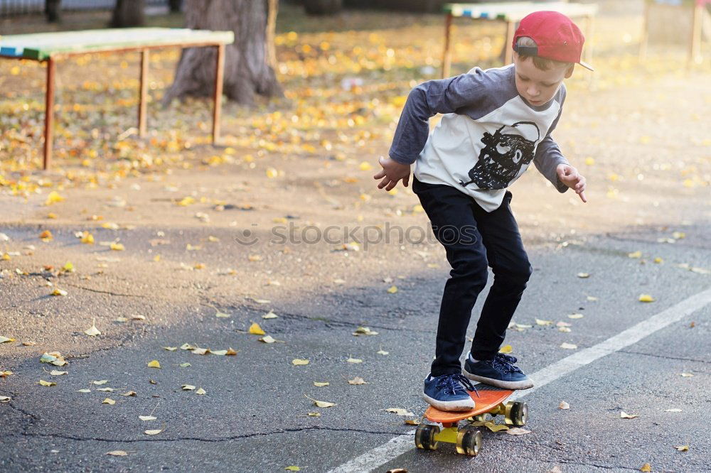 Similar – Boy with skateboard in the park