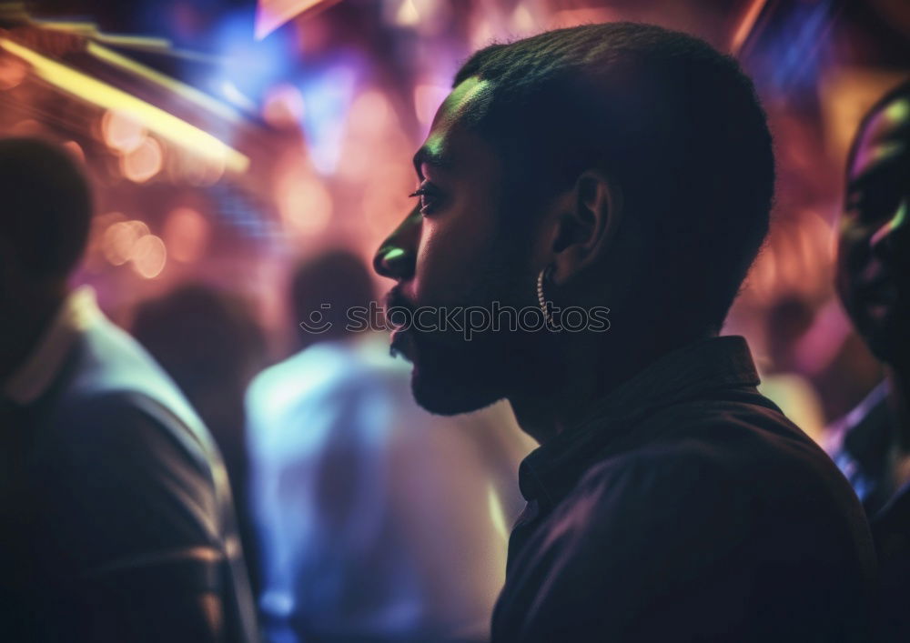 Barber shaving beard of customer