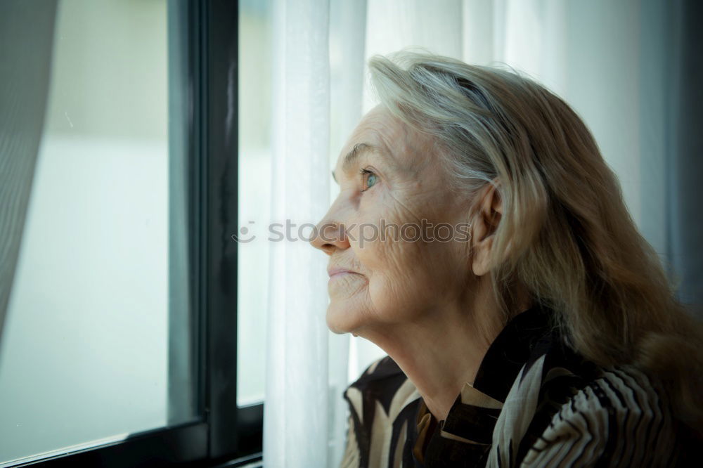 Similar – Image, Stock Photo Senior citizen looks at her smartphone in the autumn forest