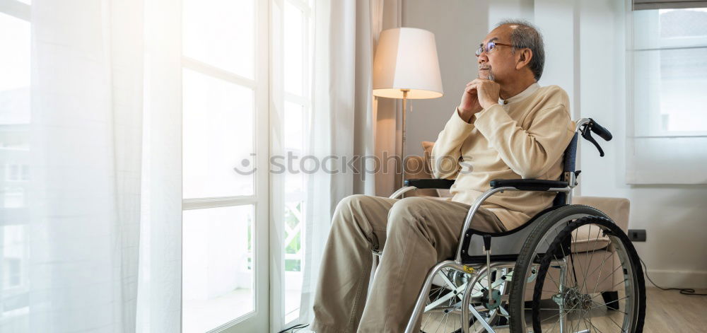 Senior woman sitting in wheelchair in hospital