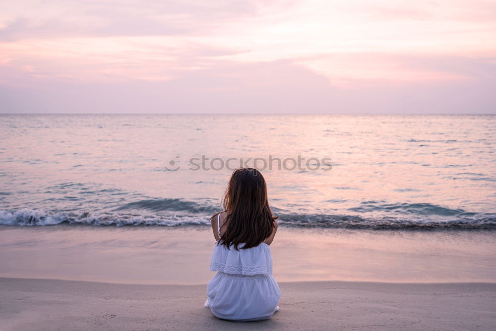 Similar – Image, Stock Photo Thoughtful child sit at waterfront. Back view