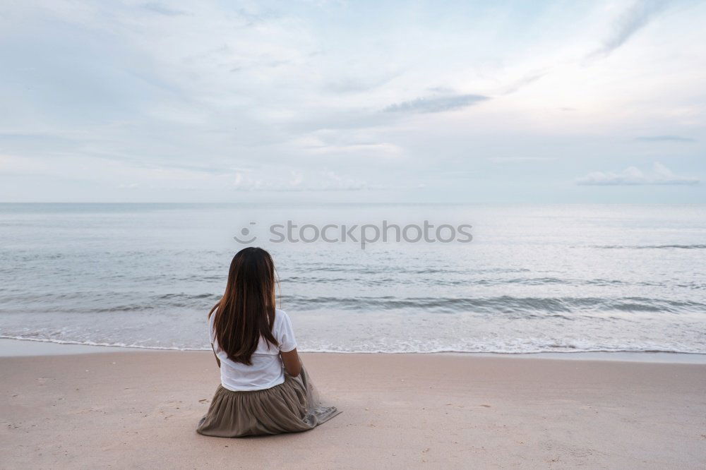 Similar – Image, Stock Photo Thoughtful child sit at waterfront. Back view