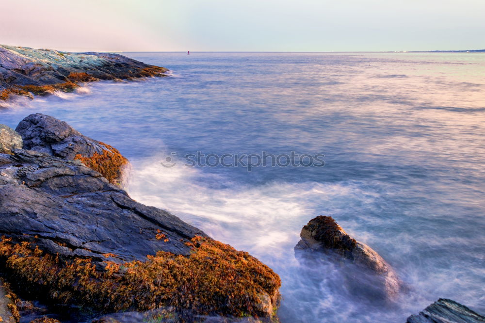 Similar – Waves of the Atlantic break foaming at the coast of Ireland