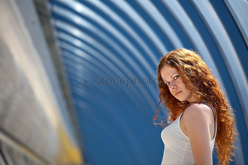 Image, Stock Photo Woman with afro hair jumping down a slide.