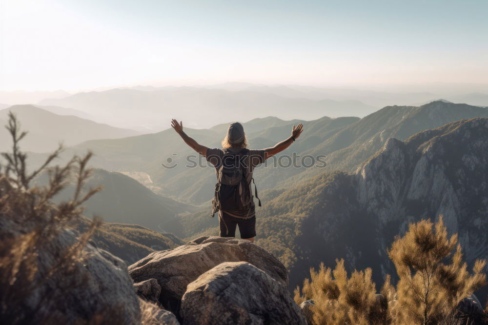 Similar – Man admiring view on cliff