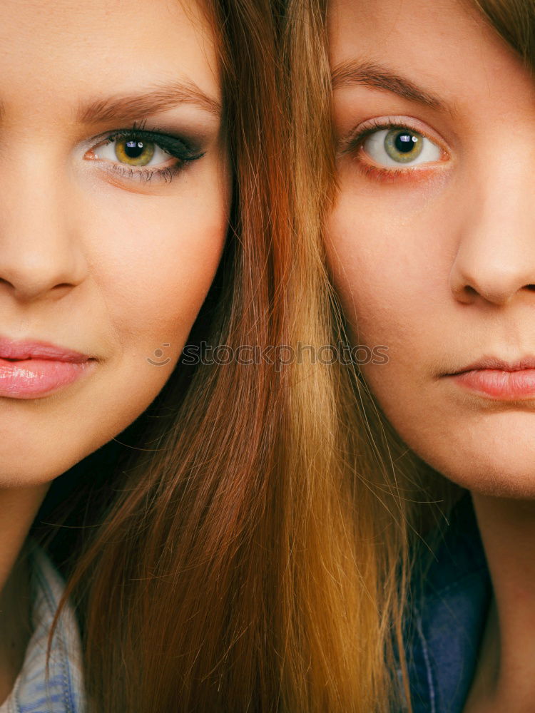 Similar – Two women embracing in studio