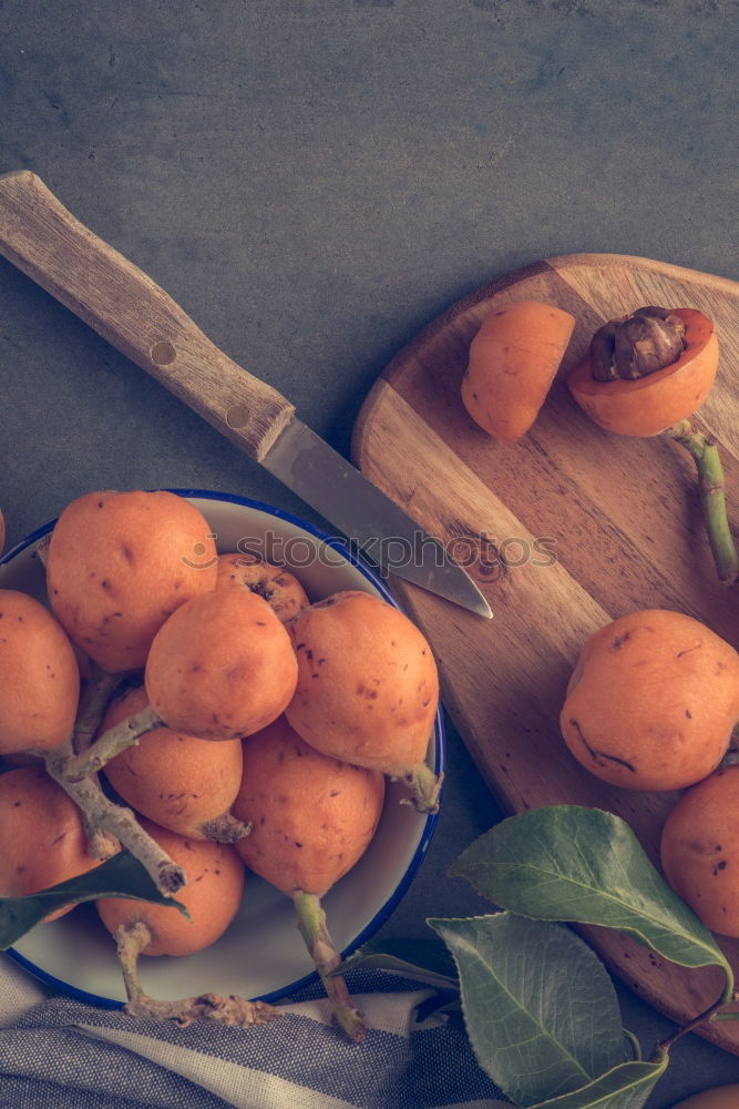 Similar – Image, Stock Photo Kumquat fruits on a dark wooden background