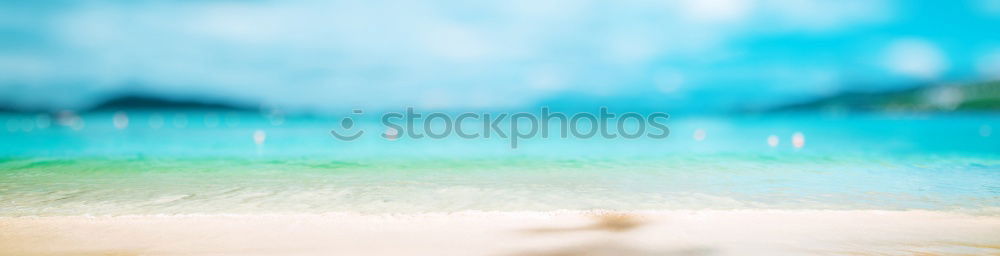 Similar – Beach with calm blue sea and clear sky