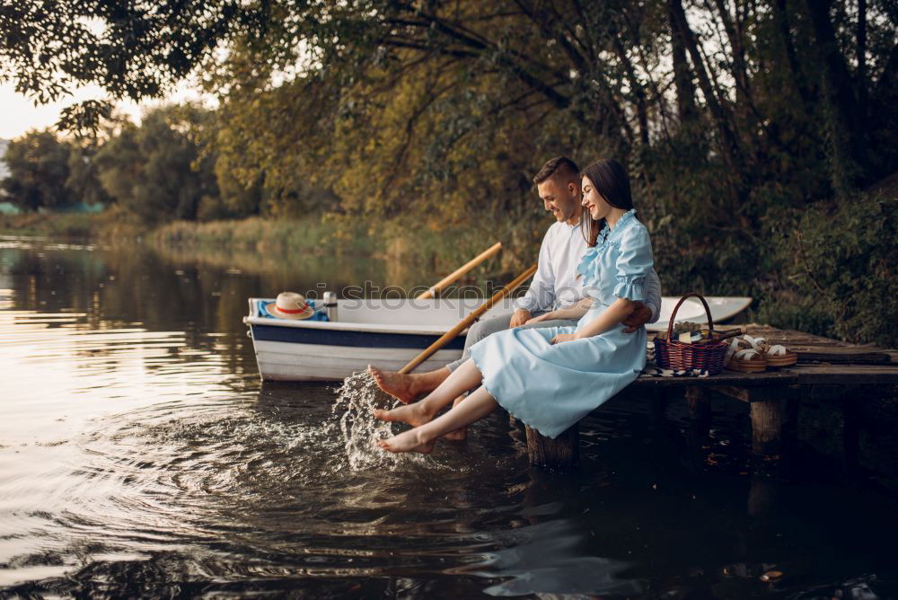 Similar – Image, Stock Photo Boy sitting on air-filled plastic crocodile in a lake