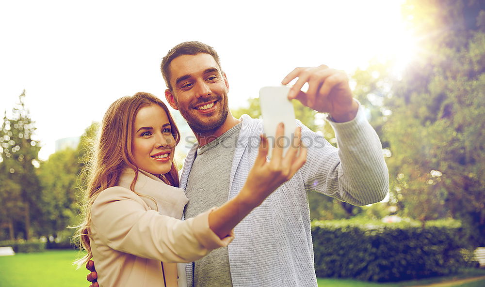 Similar – Smiling couple of lovers having fun.