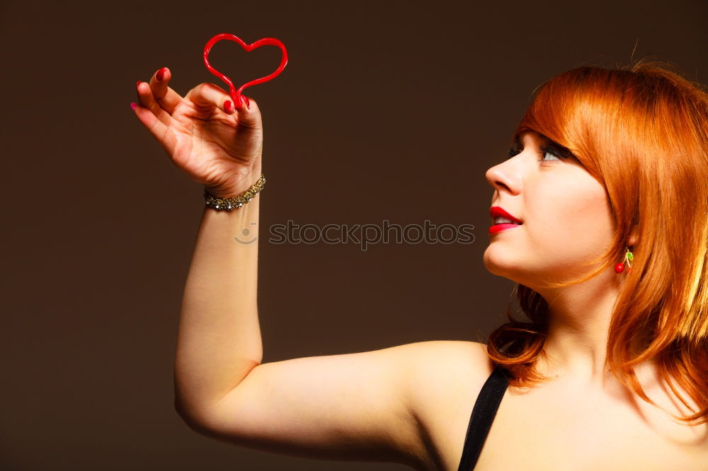 Similar – Girl making a heart shape symbol