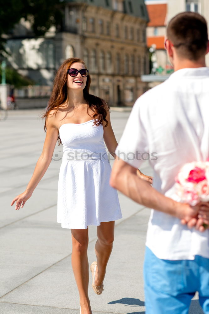 Similar – Romantic Young Couple Walking in the City.