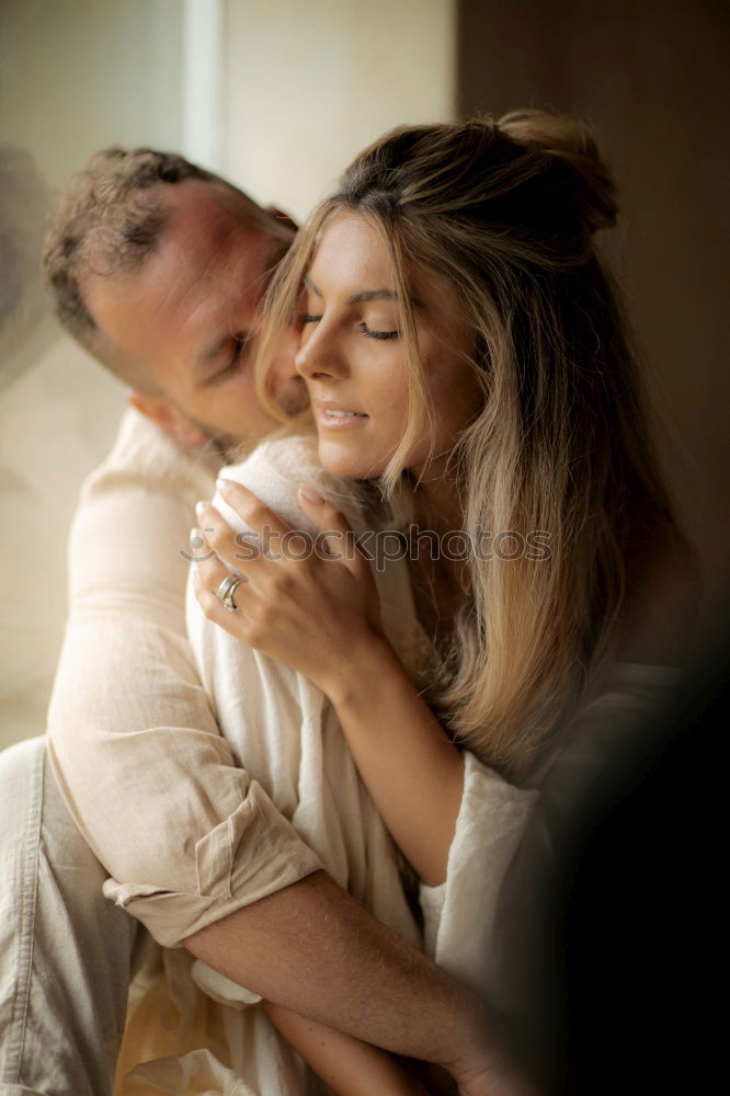 Similar – Image, Stock Photo Couple embracing in car