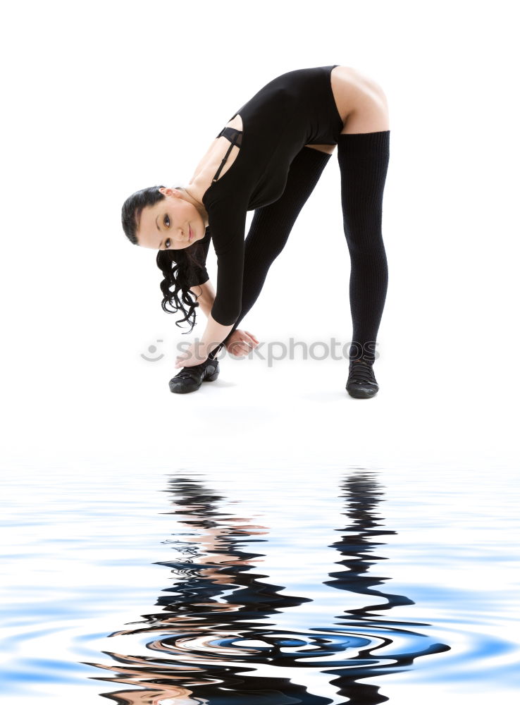 Similar – Young woman in a bathing suit lying in water