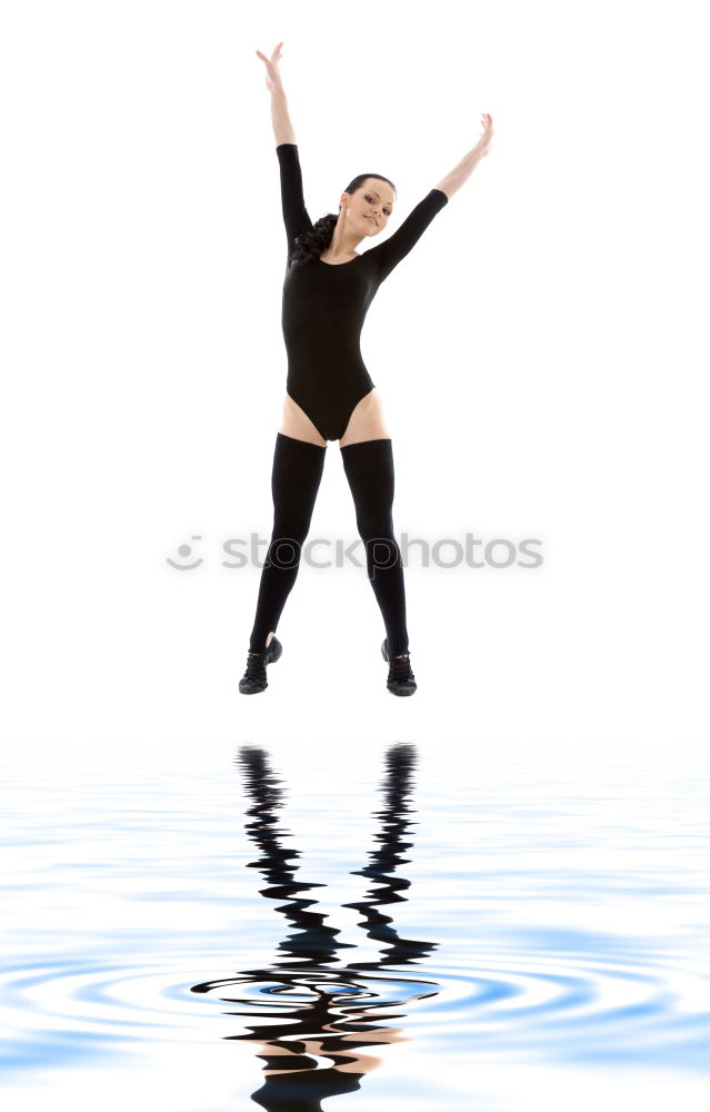 Similar – Young woman in a bathing suit lying in water