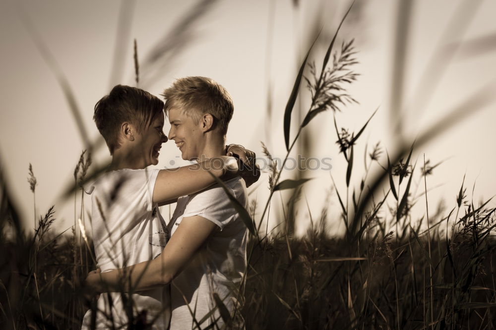 Similar – Image, Stock Photo Happy couple hugging and kissing near tree in park