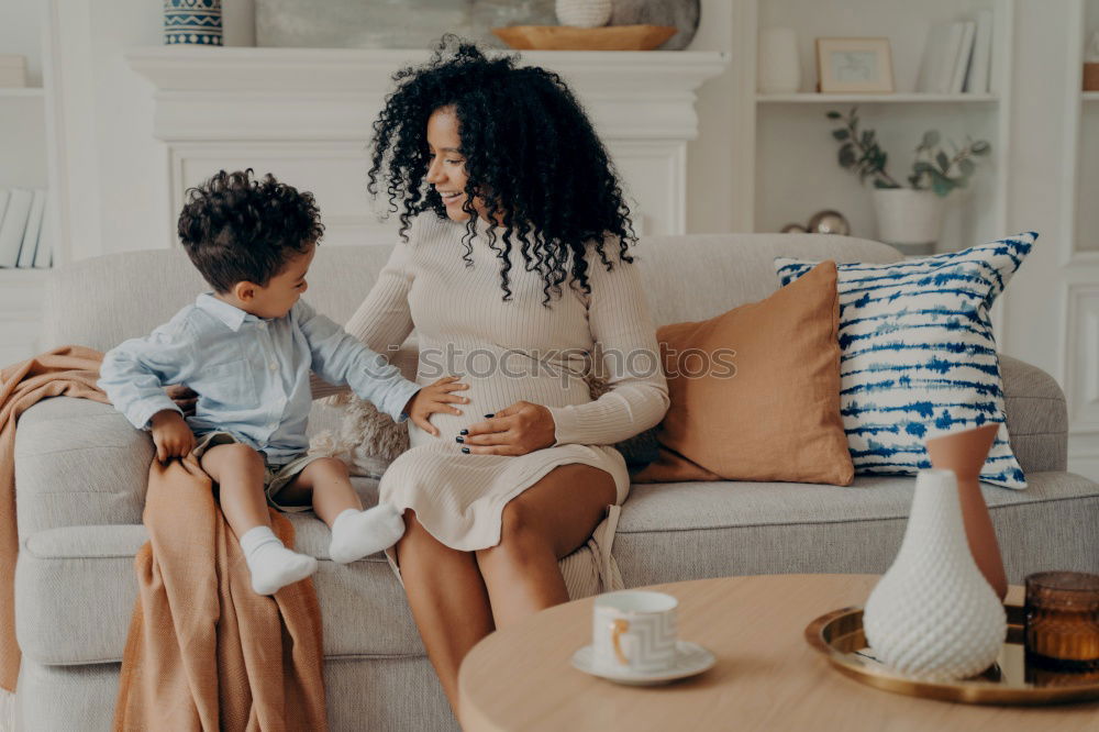 Similar – Image, Stock Photo little african girl is helping her mum preparing cupcake dough