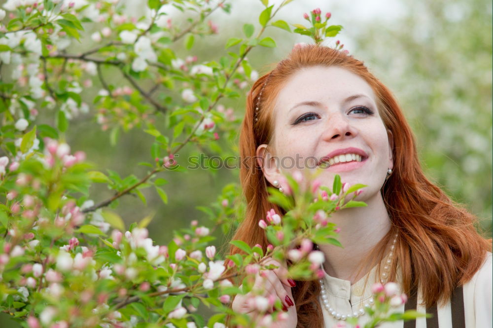 Similar – Pretty happy woman with red long hair