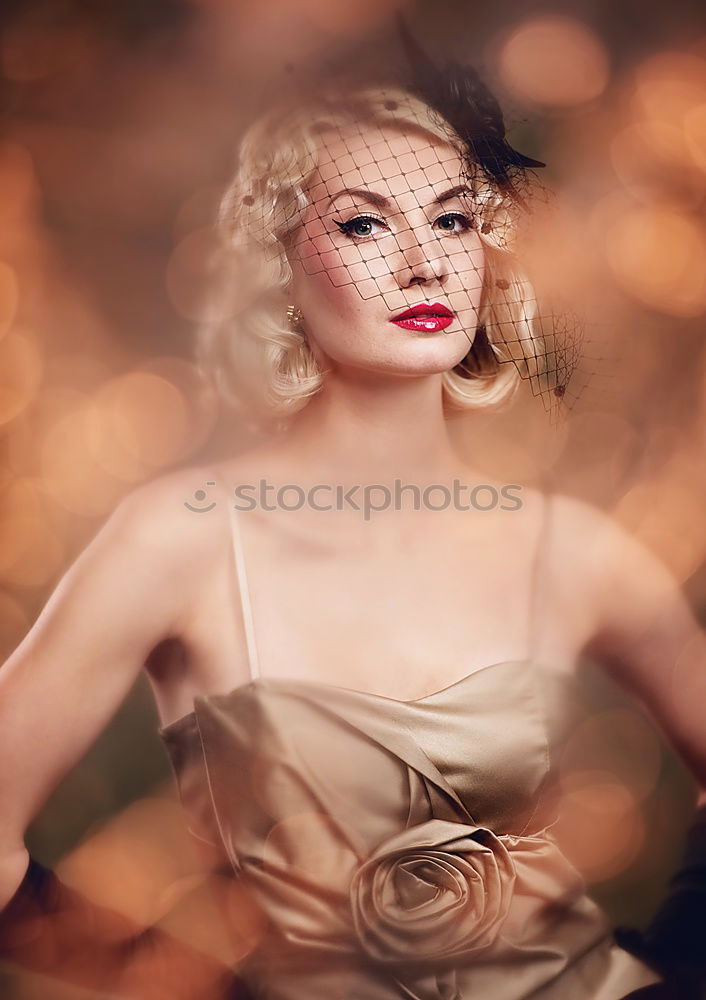 Similar – blonde young woman with flowers in background