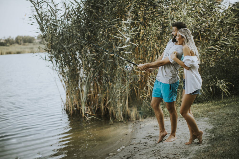 Similar – Image, Stock Photo Father and son playing on the beach at the day time. They are dressed in sailor’s vests and pirate costumes. Concept of happy game on vacation and friendly family.