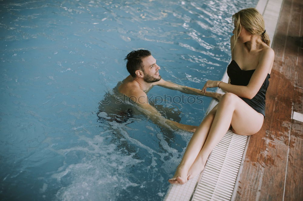 Similar – Image, Stock Photo Woman with orange swimsuit in pool