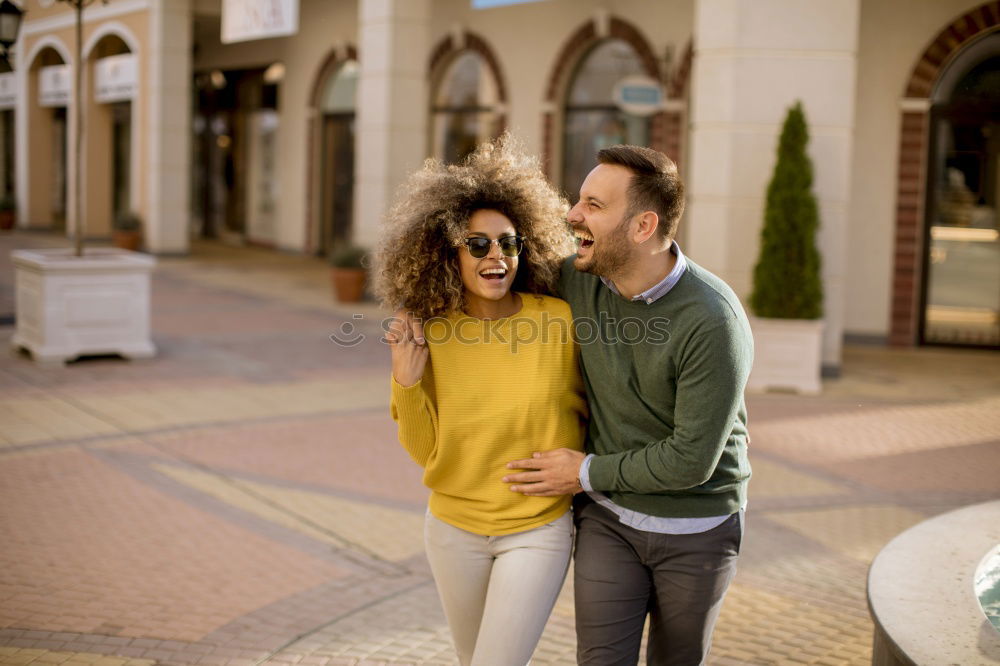 Similar – Image, Stock Photo Interracial couple having fun on the rooftop