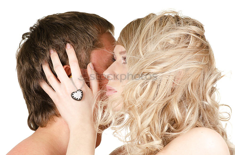 Similar – Image, Stock Photo Kissing couple at stone wall with metal decorated bars