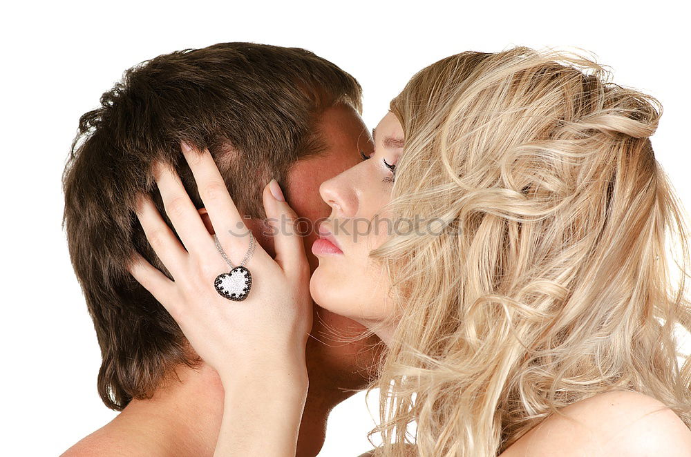 Similar – Image, Stock Photo Kissing couple at stone wall with metal decorated bars