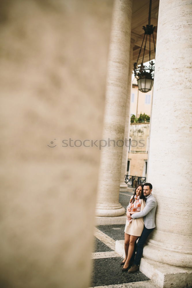 Similar – Boyfriend embracing his girlfriend in the street