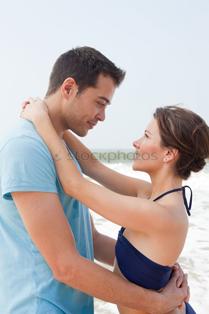 Similar – Image, Stock Photo Loving couple posing on beach