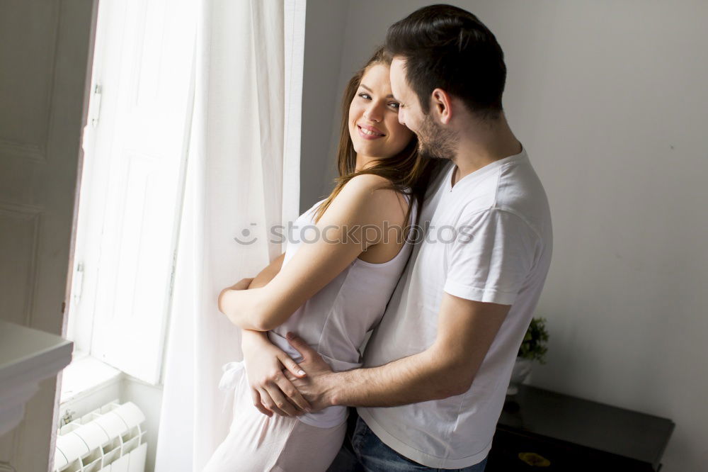 Similar – Image, Stock Photo Lesbian couple kissing in the bathroom of their home