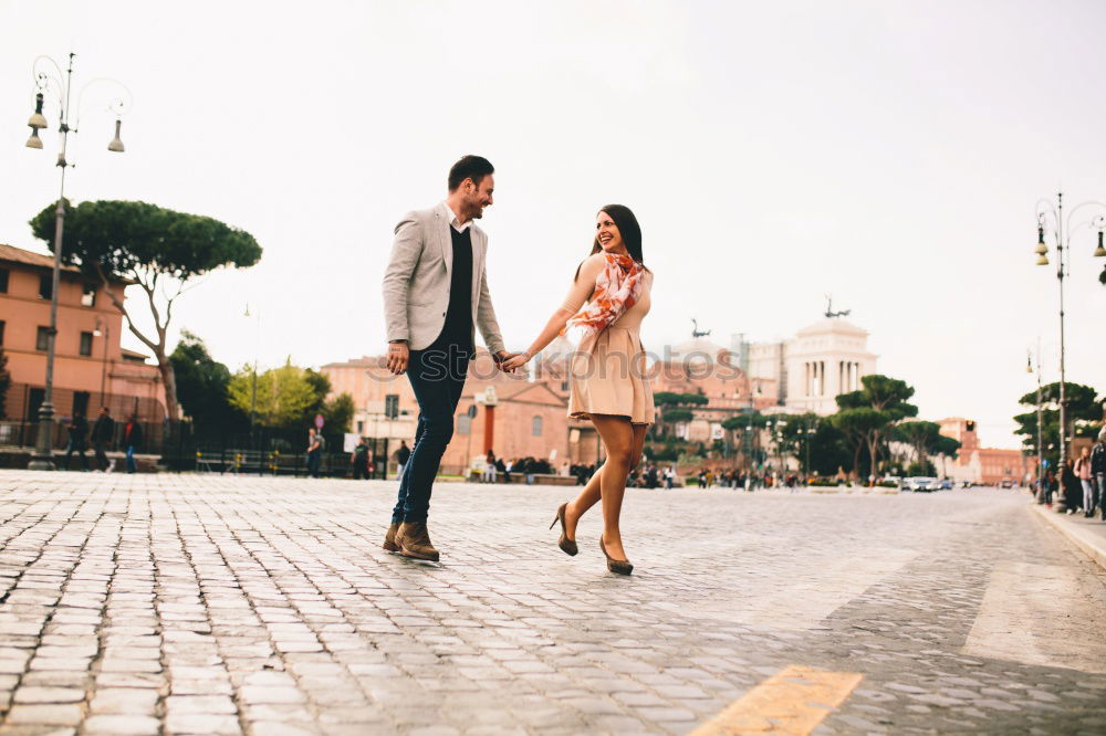 Similar – Beautiful couple hugging on crosswalk