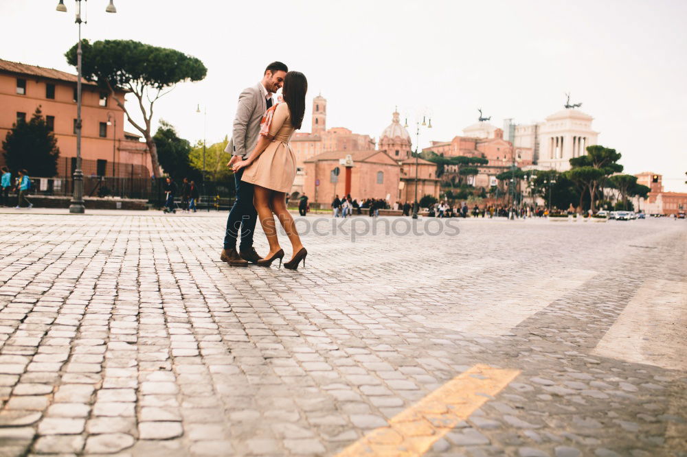 Similar – Boyfriend embracing his girlfriend in the street