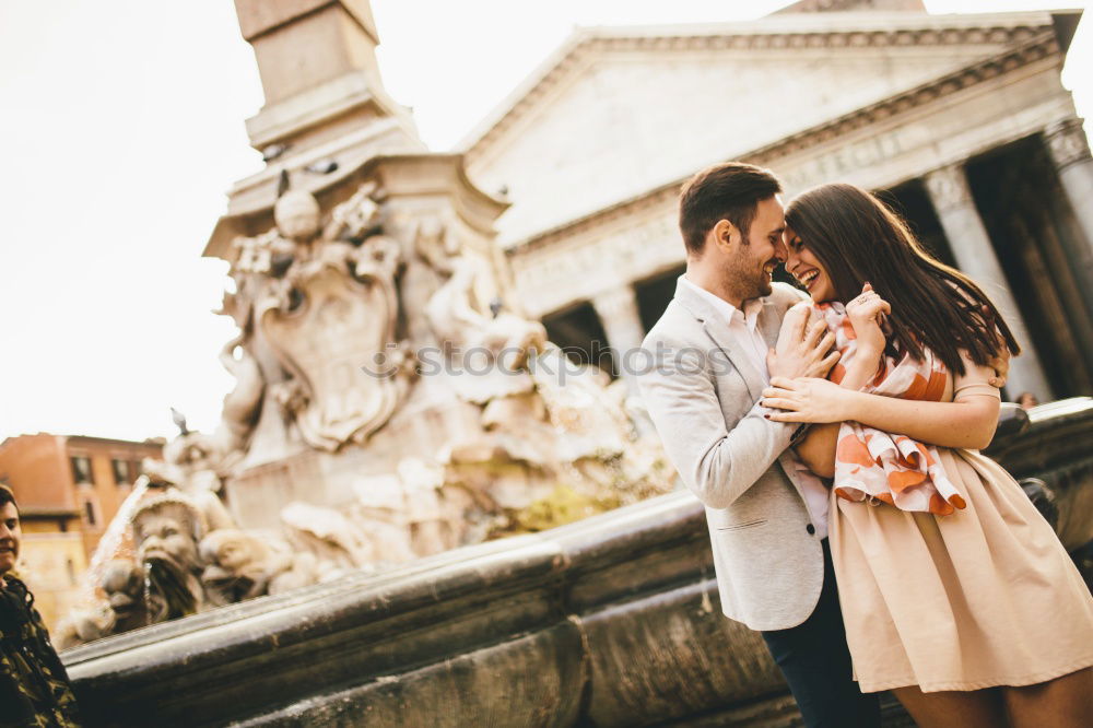 Similar – Boyfriend embracing his girlfriend in the street