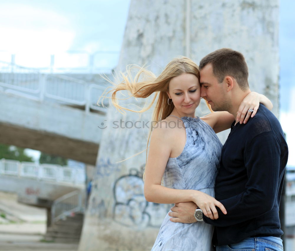 Similar – Image, Stock Photo Two loving sisters comforting each other hugging each other in a close embrace as they stand outdoors in the countryside