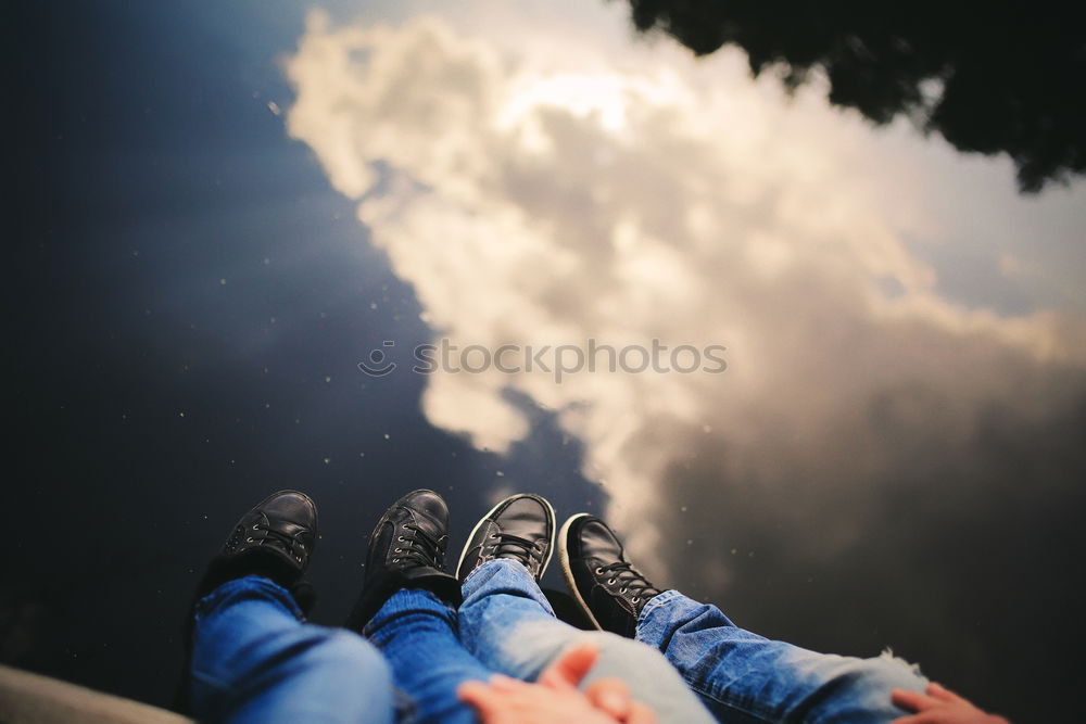 Similar – Image, Stock Photo Legs of tourist on edge