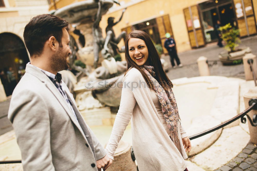 Similar – Image, Stock Photo Smiling couple of lovers having fun.