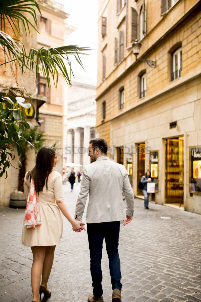 Similar – Boyfriend embracing his girlfriend in the street