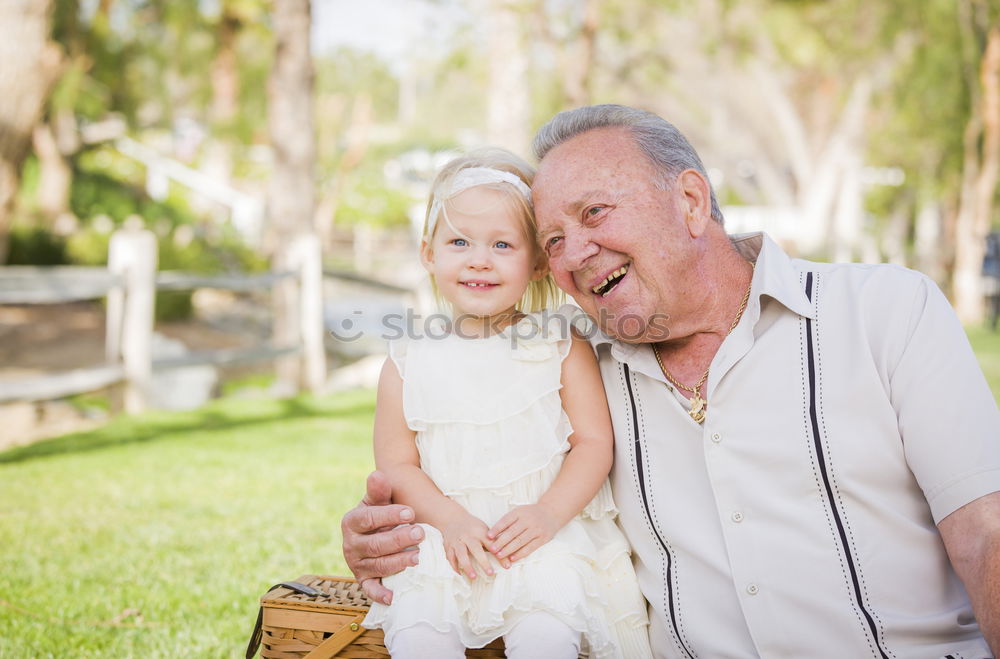 Similar – Image, Stock Photo Grandfather and grandson with a electric wheelchair