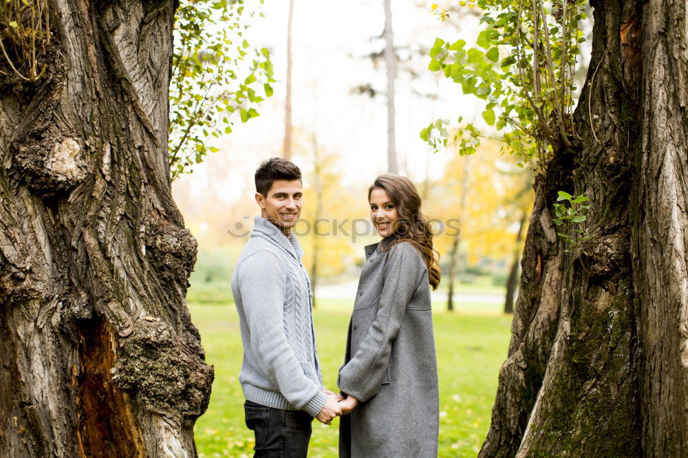 Similar – Couple in fir branches