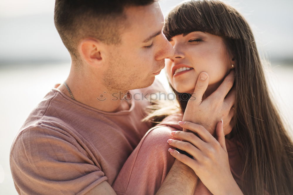 Similar – Cheerful couple having fun