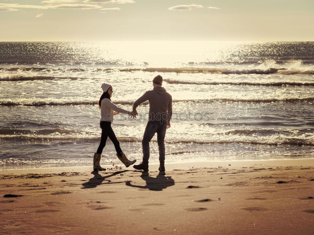 Similar – Father and son playing on the beach at the day time.