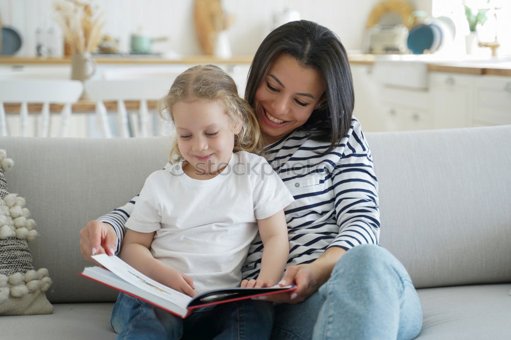 Similar – happy mother and toddler son using tablet