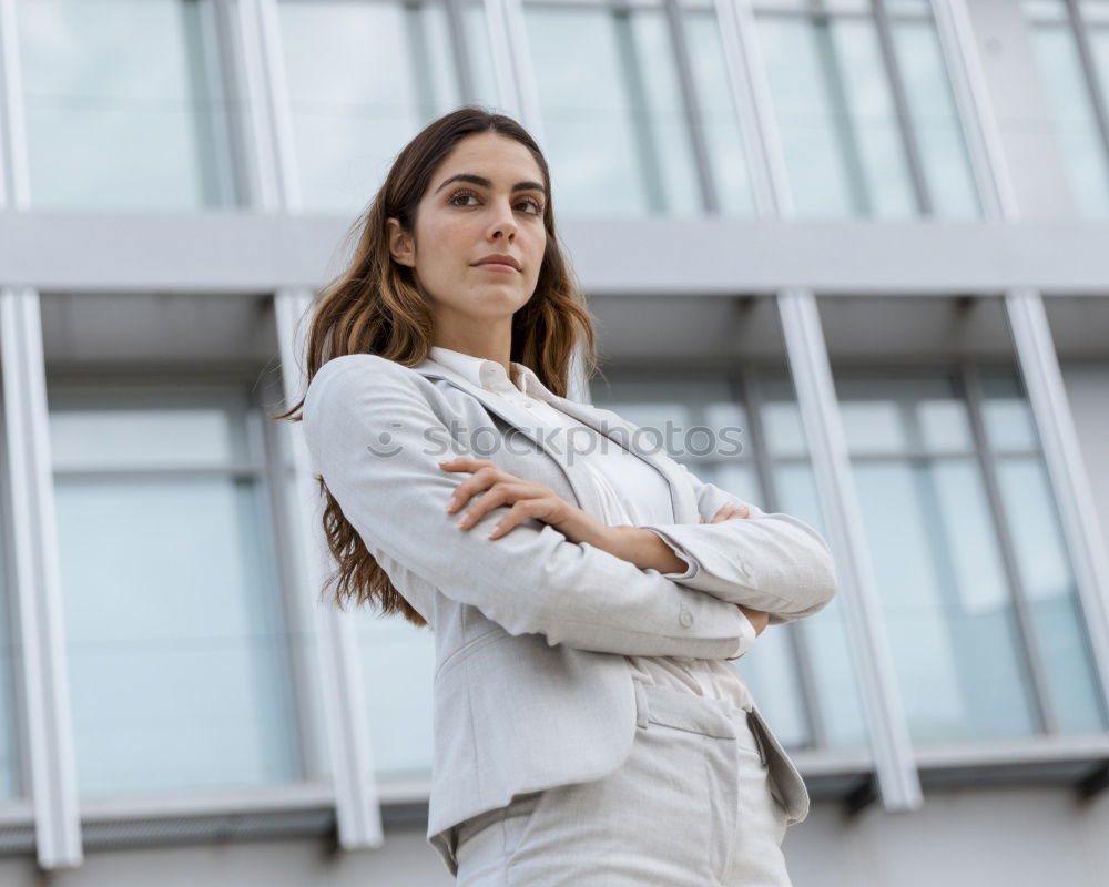 Similar – Image, Stock Photo Young businesswoman standing outside of office building