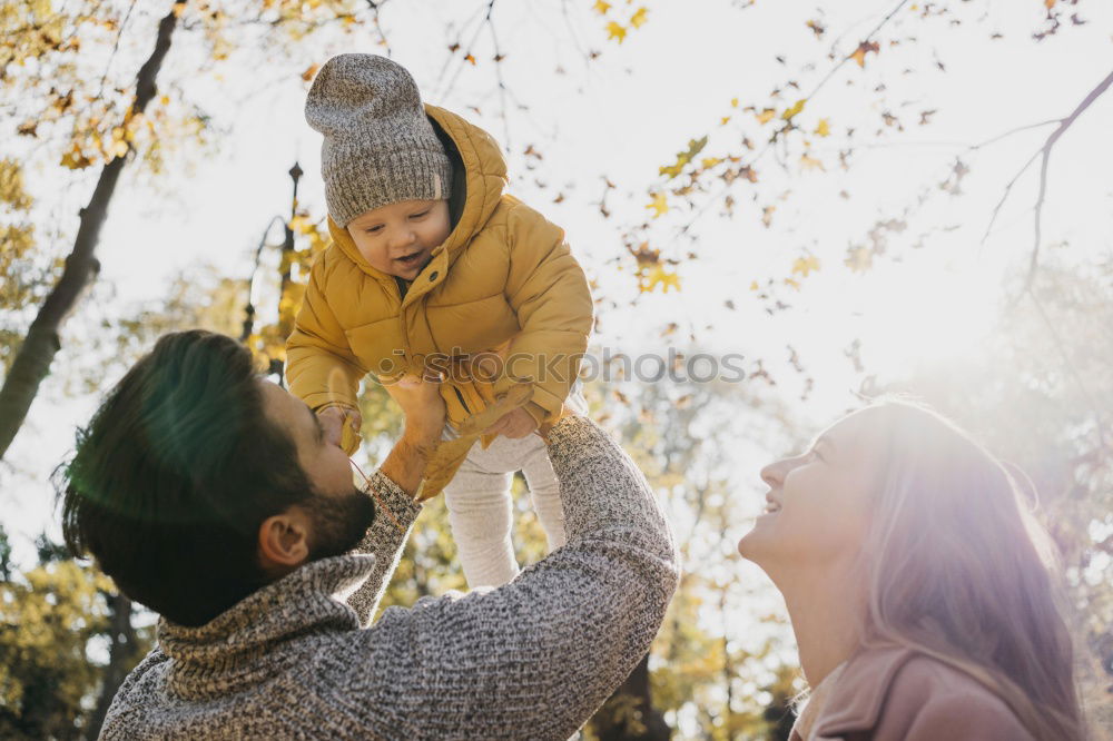 Similar – Image, Stock Photo Happy couple with daughter in the forest